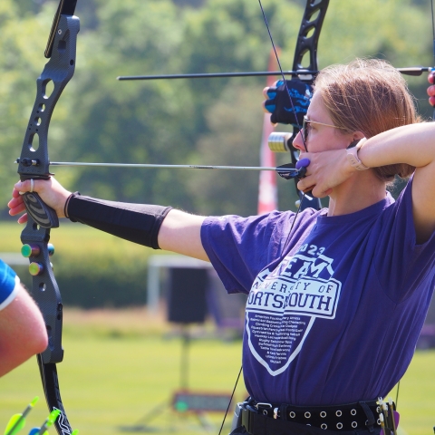 University of Portsmouth archer aiming bow and arrow