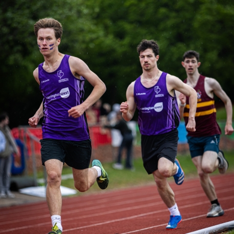 Students in a running race at Varsity 2026