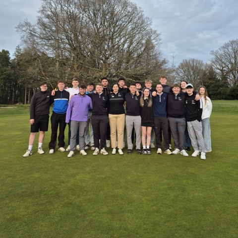 Students from UOP golf club together after a match