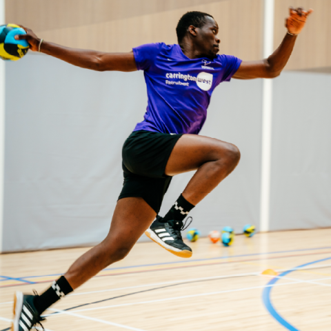 Student playing handball