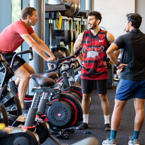 Photo of male visitors talking at bike station of  Fitness Suite - Ravelin Activities