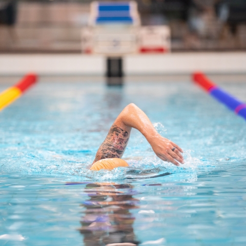 Front photo of man swimming in pool
Ravelin Interior