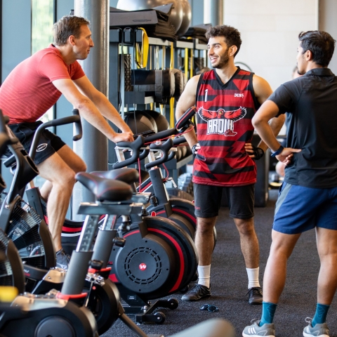 Photo of male visitors talking at bike station of  Fitness Suite - Ravelin Activities