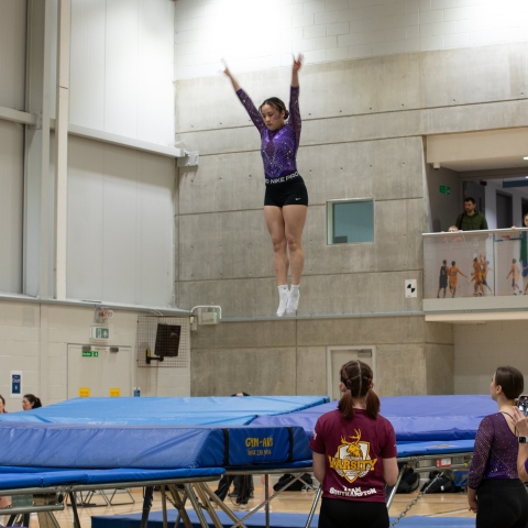 Student in trampoline competition