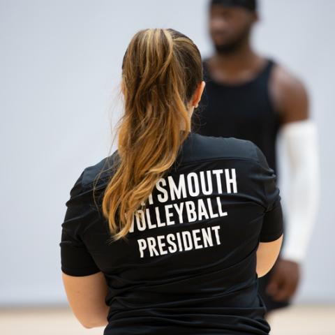 Back shot of shirt with Volleyball President text - Ravelin Activities