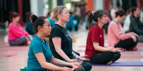 Girls' Night attendees meditating during Yoga session