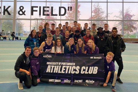 team uop athletics at an event