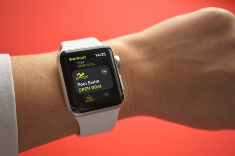 Close up of a smartwatch showing swimming information