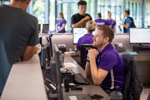 Photo of staff helping visitors with queries at Reception - Ravelin Activities
