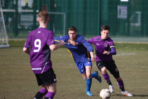 Ilya playing football at university