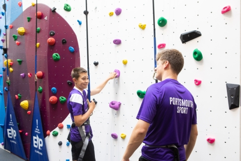 Instructor teaches child who to scale the bouldering wall at Ravelin Sport Centre.
Ravelin Sports Event - Children