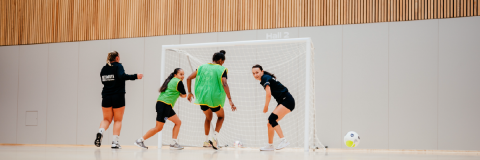 Women's football club in sports hall