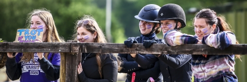 Students spectating at an Equestrian event