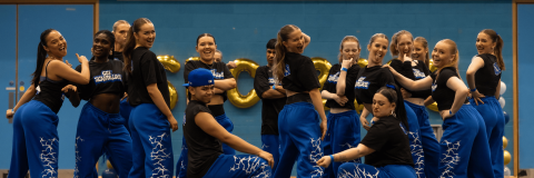 Group of students at the end of their hip hop dance routine