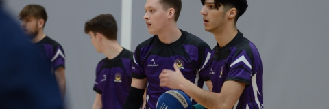 Dodgeball player holding a blue ball