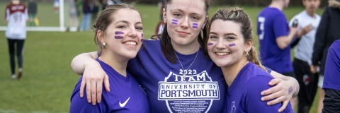 Three students before a sports game