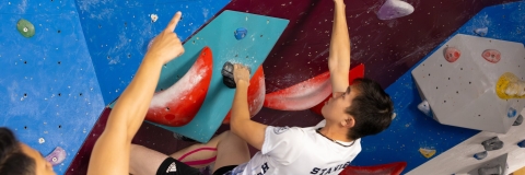 Climber on a bouldering wall