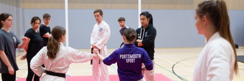 Students trying out Karate at a Give Me Sport taster session