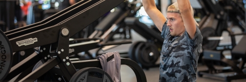 Photo of male visitor exercising using fitness suite - Ravelin Activities