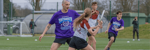 Students competing in an Ultimate Frisbee match at Varsity 2025