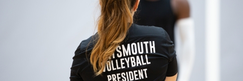 Back shot of shirt with Volleyball President text - Ravelin Activities