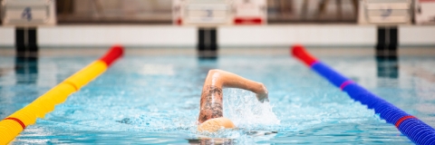 Front photo of Man swimming lengthRavelin Interior