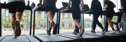 Visitors using treadmills in fitness suiteRavelin Internal Photos