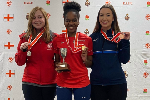 Three girls with medal