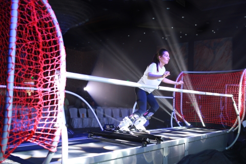 Woman using ski simulator