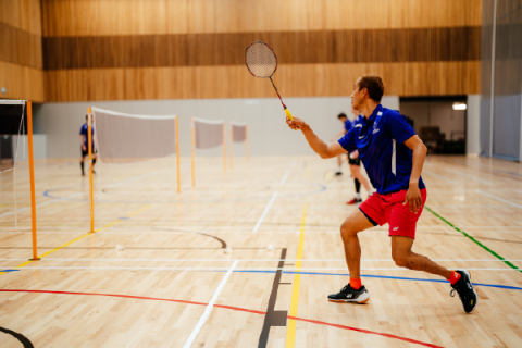 Student playing badminton