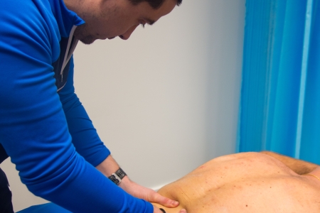 SCRx Physiotherapist doing a back massage