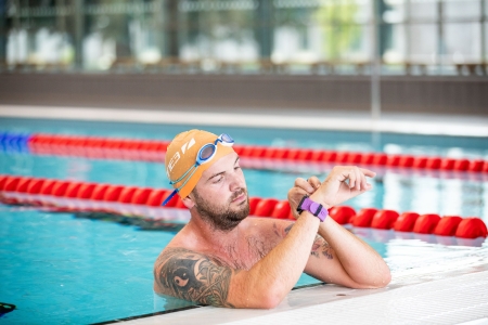 Man adjusting watch at pools edge
Ravelin Interior