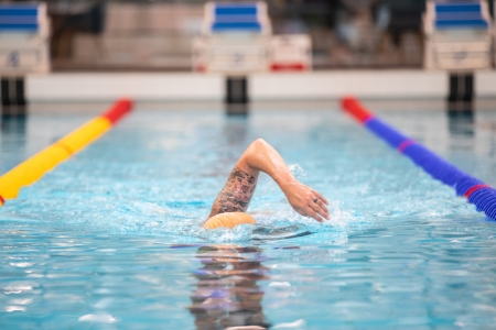 Front photo of man swimming in pool
Ravelin Interior